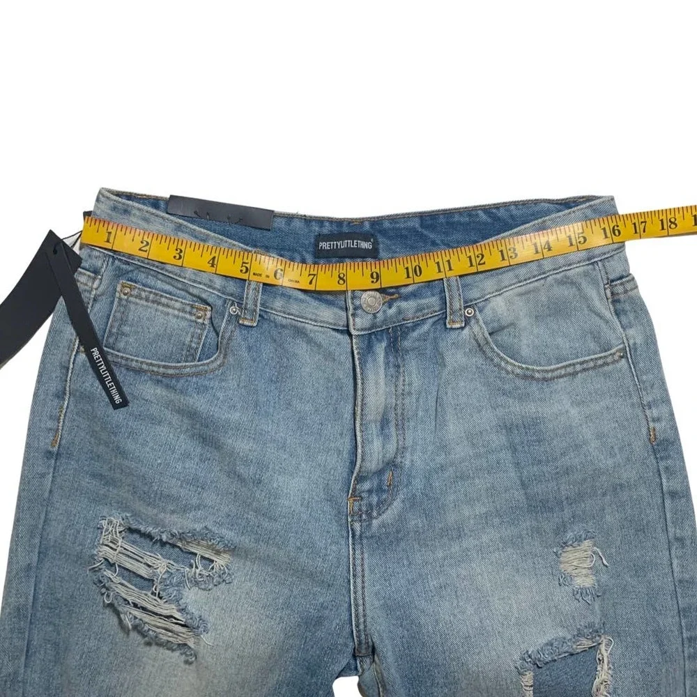 PrettyLittleThing | Women | Light Wash Extreme Distressed Mom Jeans | Size 29